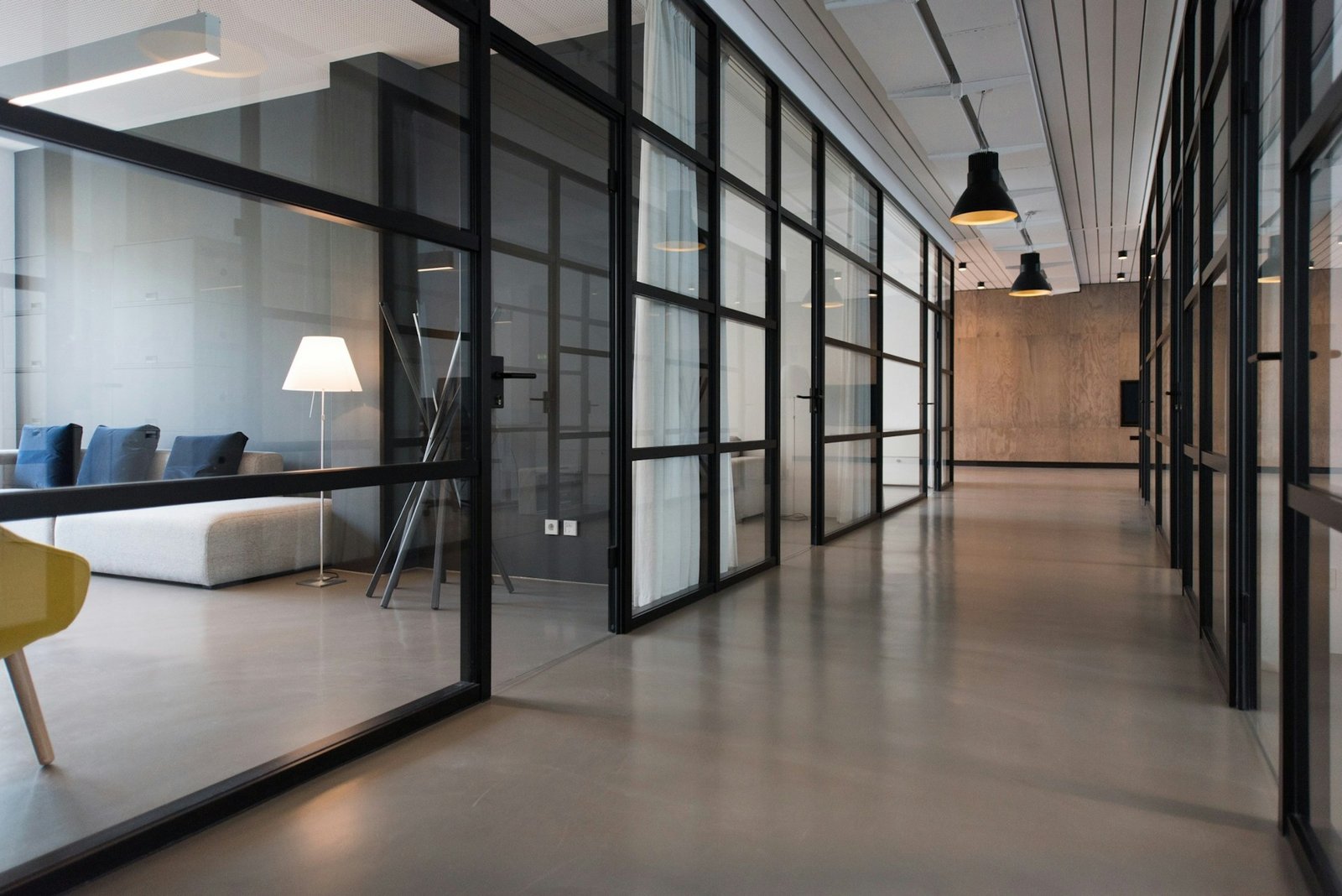 Glazier fitting a large glass panel